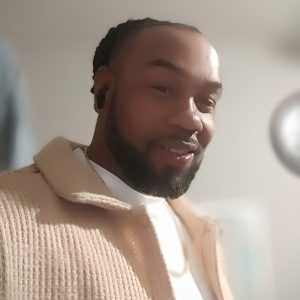 Portrait of Danny, Master Barber at The Master’s Touch Barbershop in Chesapeake, VA